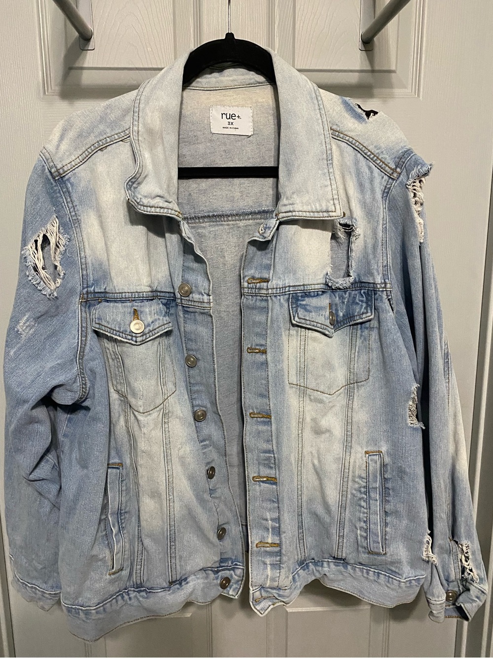 Light Wash Distressed Denim Jacket - Women's